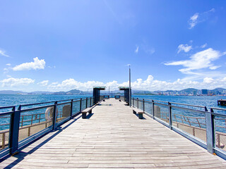 Fototapeta premium Whispers of the Sea: Serenity at the Wooden Pier