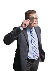 Funny man businessman man with a magnifying glass in his hand