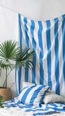 Serene Bedroom Interior with Striped Blue and White Decor and Tropical Plant