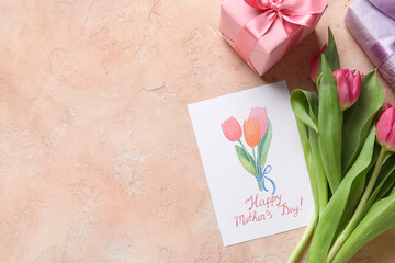 Festive postcard with gift boxes and tulips on beige grunge background. Happy Mother's Day
