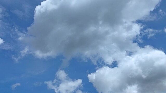 Blue sky and cumulus cloud cloudscape timelapse, Summer blue sky time lapse, Nature weather blue sky. Cloud time lapse nature background.