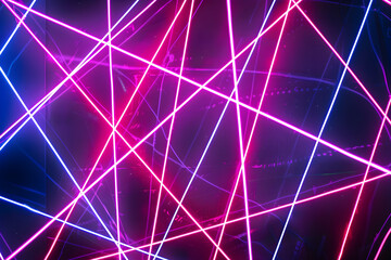 Futuristic neon lines in an electric web pattern. Abstract art on black background.