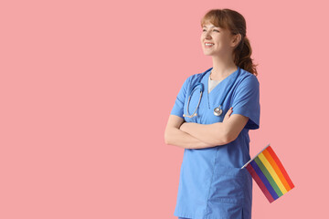 Female doctor with LGBT flag on pink background