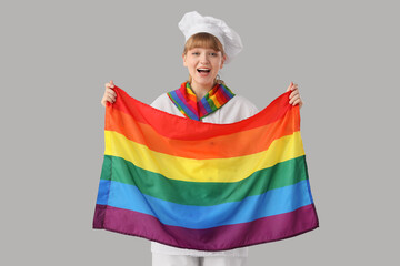 Female chef with LGBT flag on light background