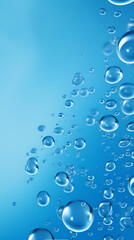 Close-up of water drops on blue background