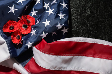 Obraz premium Flag of USA and poppy flowers on dark background. Memorial Day celebration