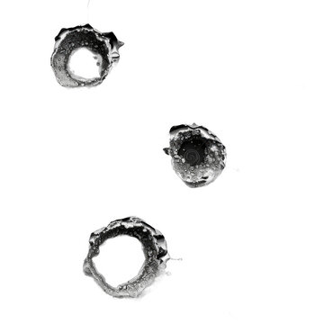 Isolated bullet holes PNG with transparent background. Realistic and dramatic graphic element
