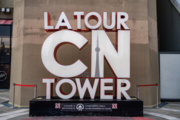 Fototapeta premium LA Tour CN Tower sign in Downtown Toronto. Toronto, Canada - April 29, 2024.