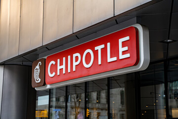 Fototapeta premium Chipotle in Downtown Toronto. Chipotle Mexican Grill often known simply as Chipotle, is an international chain of fast casual restaurants. Toronto, Canada - April 29, 2024.