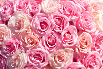 Background full of realistic fabric Roses, Fabric roses texture background