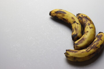 Three rotten banana isolated on white background