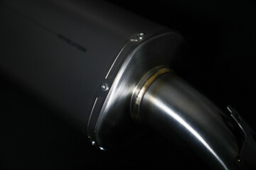 Studio close-ups of a exhaust and its metal