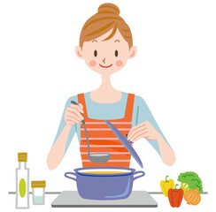 料理をする主婦　キッチン　ママ