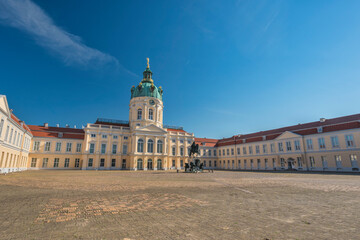 Berlin, Germany - July 19, 2022 : front side at Charlottenburg Palace (Schloss) the Baroque summer palace with garden