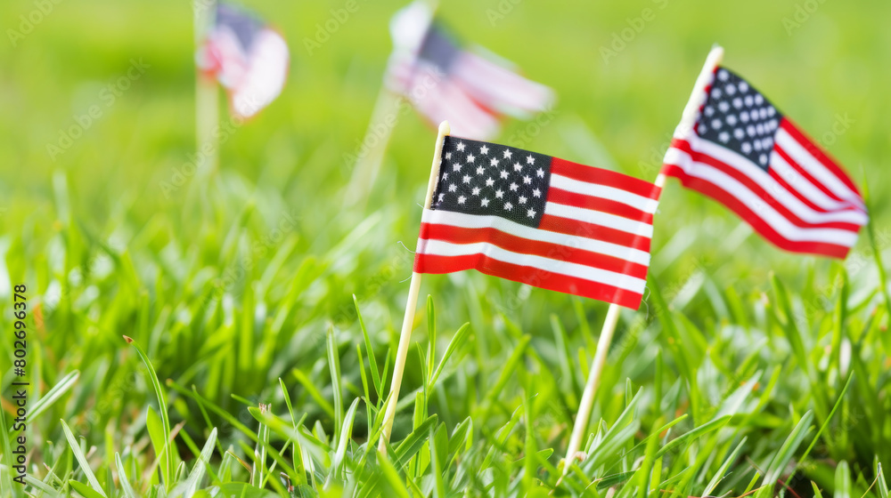 Sticker american flags in grass for patriotic celebration