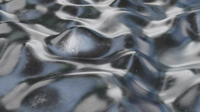 Grey metal wavy background. Loop 3D render video
