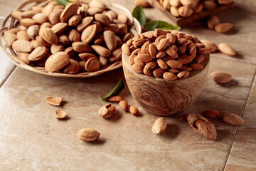 Almond nuts in a wooden bowl.