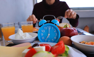Alarm clock with IF (Intermittent Fasting) 16 and 8 diet rule and weight loss concept.-Diet plan...