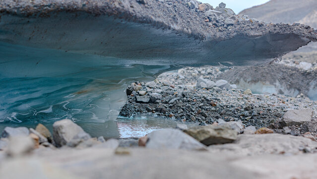 Melting glacier caught under tilled earth