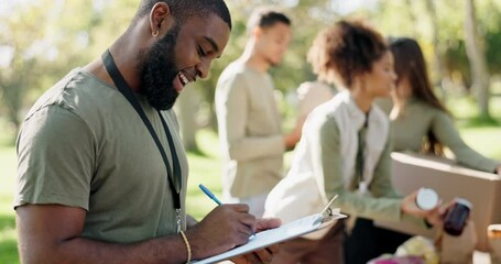 Charity, writing or man with clipboard for food donation, checklist or grocery stock management with team in forest. Community service, outreach or ngo volunteer with note planner for poverty support