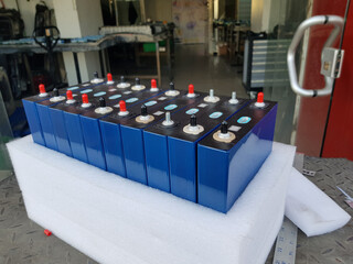 Electric cars battery cells are ready to be assembled and connected in series parallel then placed in cars