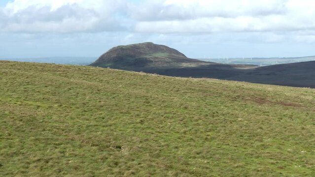 Slemish Mountain in County Antrim Northern Ireland. Aerial 50fps UHD