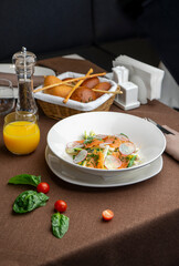 salad with radish and salmon with orange juice