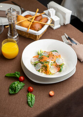 salad with radish and salmon with orange juice