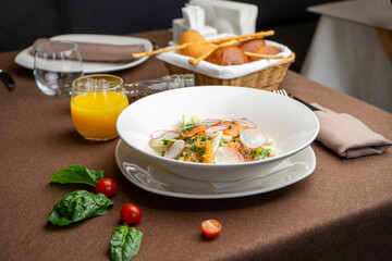 salad with radish and salmon with orange juice