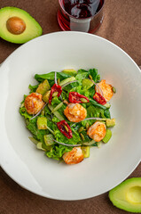 green salad with shrimp and chili pepper