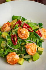 green salad with shrimp and chili pepper