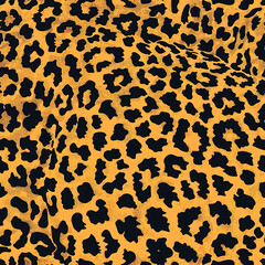 Seamless leopard print pattern on yellow background