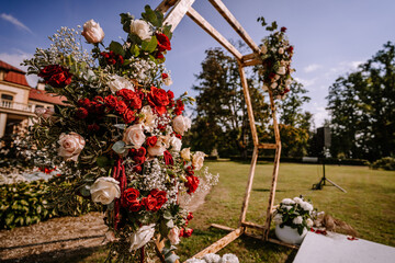 Valmiera, Latvia - August 19, 2023 - A close-up of a richly decorated floral arrangement on a...