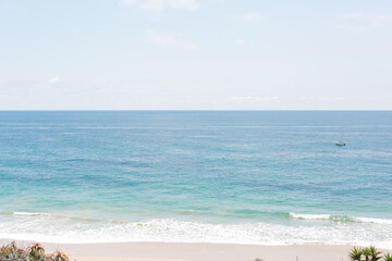 Pristine beach view with clear turquoise waters