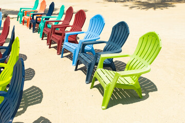 Colorful Adirondack Chairs front Sand Key West Florida Beach - Summer