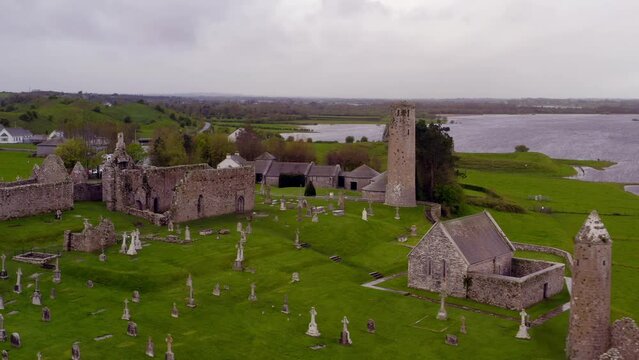 Aerial panoramic view reveals Clonmacnoise ruins with Shannon River in background