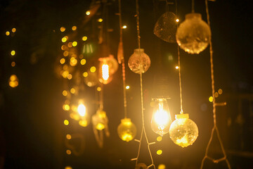 decorative ball curtain and captivating light decorations for a cozy atmosphere.
