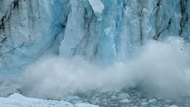 Telephoto slow-motion footage of big ice column falling in Perito Moreno, the most iconic glacier in the world.