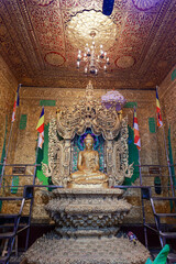 the majestic Kyaikpawlaw Buddha Image in Kyaikhto, a symbol of serenity and devotion.