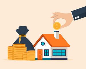 man hand holding coin and putting in home real estate investment money saving to loan house financial money saving investment.