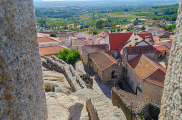 view of the remains of the walls and the medieval town of Castelo Novo, Portugal