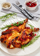 butterflied, spatchcock roast chicken on a plate