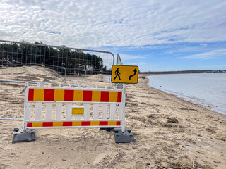 Fencing installed at repair site on beach in Estonia to prevent people from entering