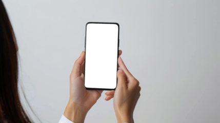 Close up of hand holding smartphone on white background