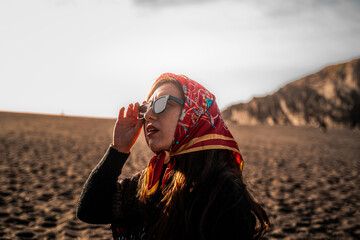 Woman enjoying the stunning scenery of Cobquecura, Nuble Region, Chile