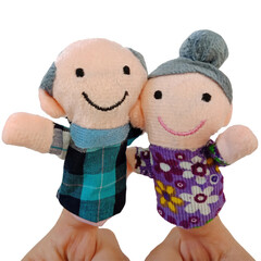 Two fingers wearing puppets; grandfather and grandmother or old man and old woman. Kid playing...
