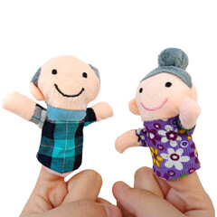 Two fingers wearing puppets; grandfather and grandmother or old man and old woman. Kid playing...