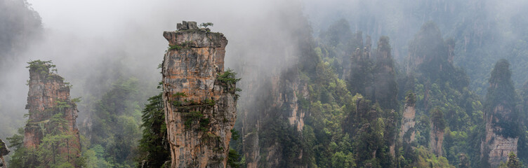 mist in the forest. panoranic view of zhangjiajie national forest park Hunan, China.. a view from...