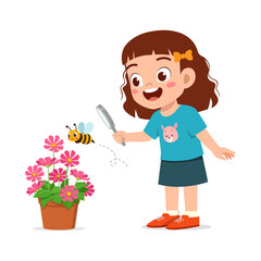 little kid use magnifying glass to observe bee