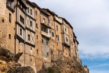 View of the façade of some brick and wooden houses in the tourist town of Frías in Burgos.